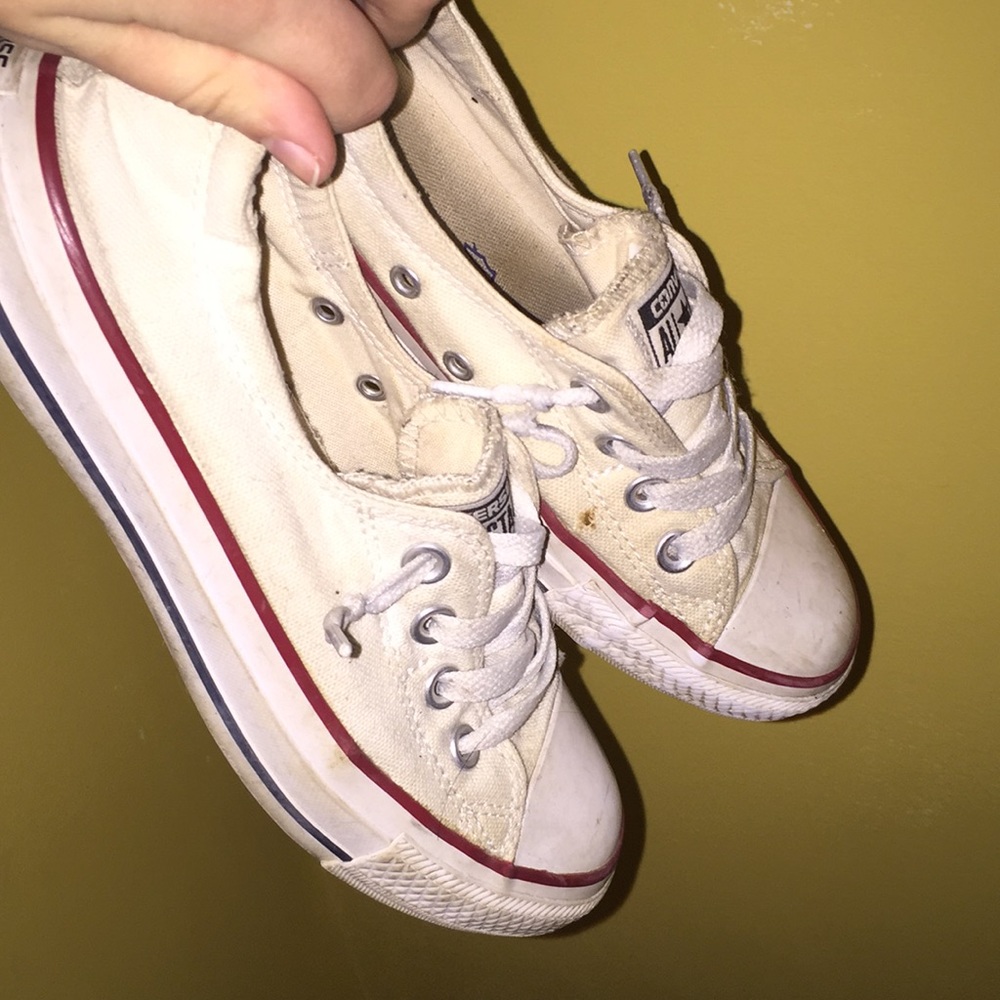 Slightly warn white converse